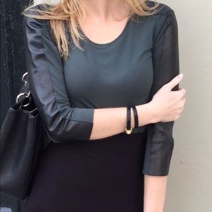 Ivy green top with leather detail